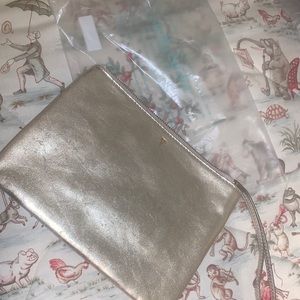 Stella and Dot in charge pouch distressed gold